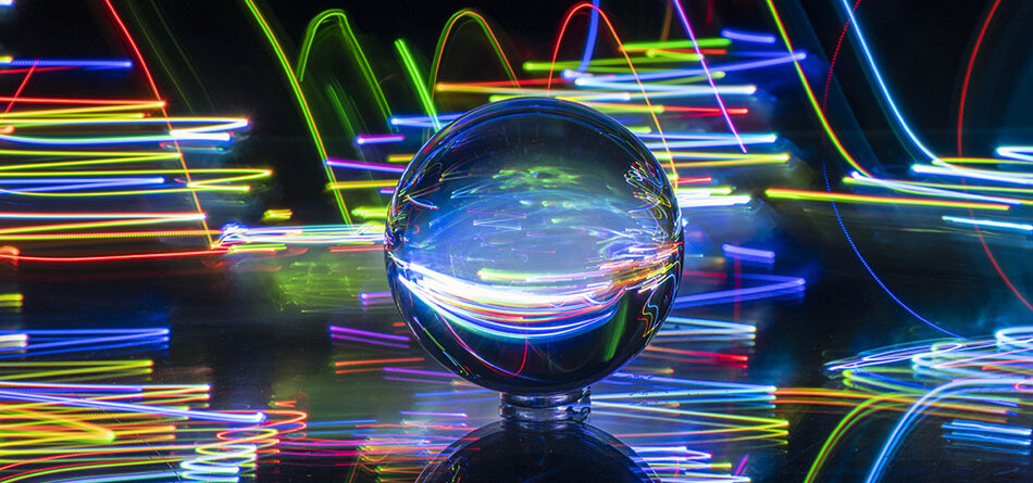 crystal ball with black background and neon lights, innovative portfolios perspectives